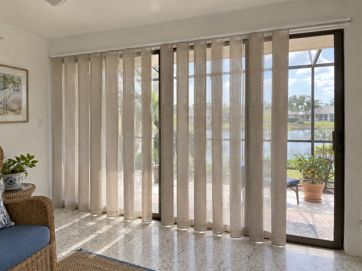 Illustration of taupe vertical sheer fabric panels across sunroom sliding doors